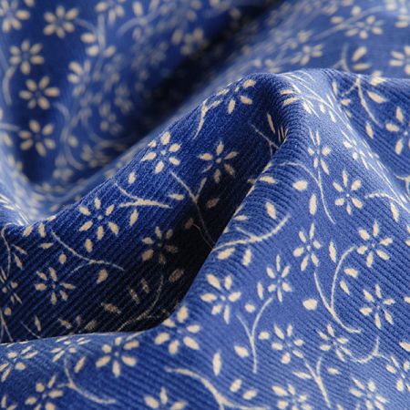 Manšestr pružný vzor drobné květy modrý