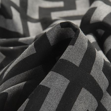 Kostýmová viskozová látka geo.vzor černá
