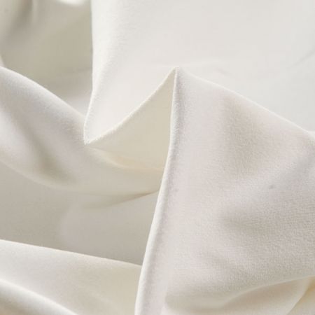 Samet bavlněný pružný lomená bílá