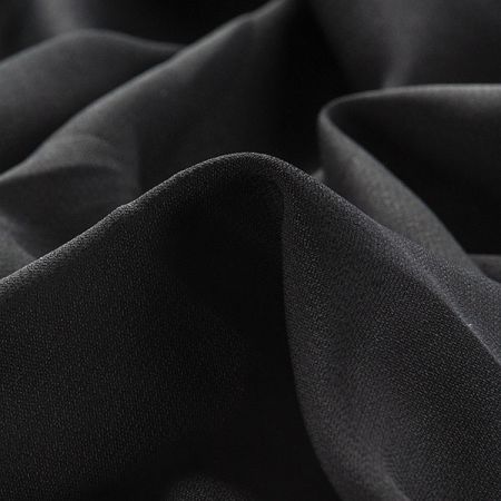 Šatový žoržet pružný jemný černé barvy II. jakost