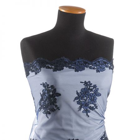 Krajka bordurová na tylu květy/ornament tm.modrá