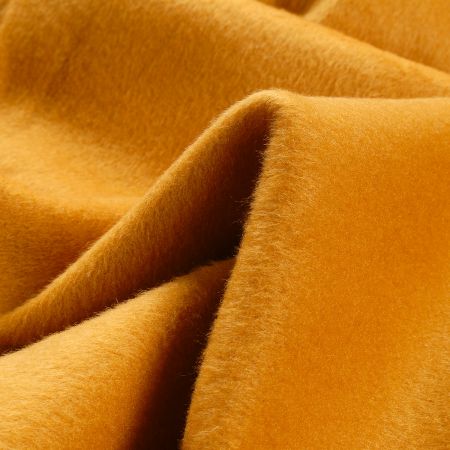 Cibelín imitace látka drobný vlas okrové barvy