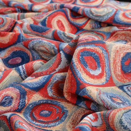 Žoržetová pletenina motiv kruhy/čtverce modrá