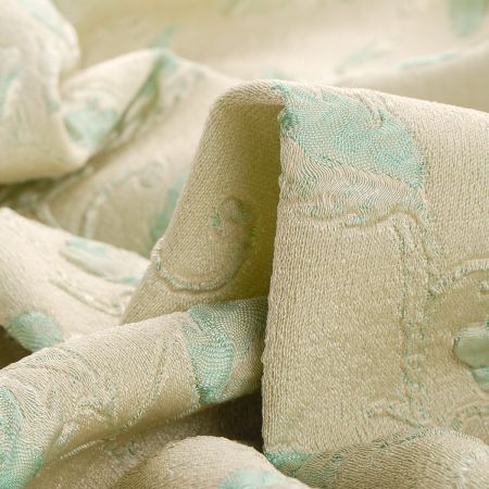 Žakárová látka se vzorem květů v pastel zelené