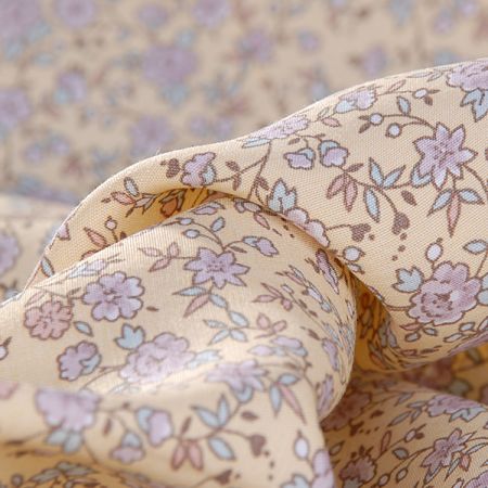 Viskozová letní látka kytičkový motiv pastel žlutá