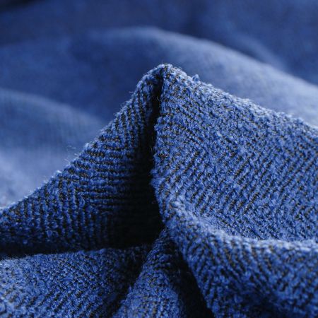 Kostýmová látka Art Fabrics rybí kost tmavě modrá