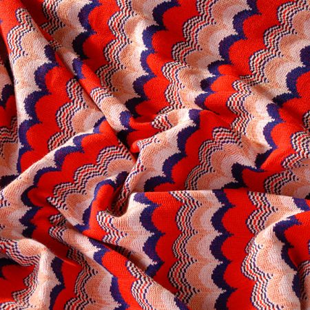 Efektní úplet vlnovky červený